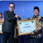 Caption:
Pemkab Sumenep menerima penghargaan bergengsi dari Persatuan Air Minum Seluruh Indonesia (PERPAMSI), yang diserahkan langsung oleh Wakil Menteri Dalam Negeri, Arya Bima, diterima oleh Wakil Bupati Sumenep, KH. Imam Hasyim, SH, MH, Kamis (12/6)